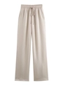 Detail of beige pleated wide-leg trousers with adjustable drawstring elastic waist - White Pants
