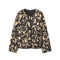 Detail of quilted jacket showing yellow leopard print texture, snap buttons and collar label - XS / Black Yellow Abstract Spotted