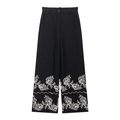 Détail de broderie florale bohème sur pantalon large taille haute en mélange de lin noir - XS / Bas / Noir