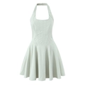 Detail van mintgroene halterjurk met korset-taille stiksel en geplooide rok - S / Groen