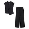 Détail du gilet noir à col en V avec ourlet asymétrique et pantalon large assorti - S / Haut Et Bas / Noir