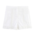 Detailed view of white crochet lace trim on lightweight cotton linen shorts for women - XS / Shorts / White