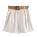 Detail of high-waist cotton linen shorts with a woven belt and round wooden buckle - Off White