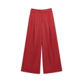 Dettaglio di pantaloni rossi a vita alta con gamba larga, pieghe frontali e tessuto liscio - XS / Pantaloni Rossi