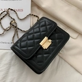 Classic black quilted crossbody bag with golden chain strap and rectangular metal lock - Black