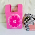 Detailed close-up of vibrant pink knitted tote bag featuring a floral jacquard sunflower - Pink Sunflower
