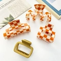 Matte checkerboard hair claw clips set in orange and white pattern for women - 4-Piece Orange Set