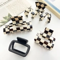 Set of four checkered and matte black hair claws in geometric square and wavy shapes - Black & White 4-Piece Set