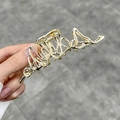 Elegant gold-tone metal Triomphe logo hair claw clip for stylish women's hair styling - Gold Octopus Shape Sapphire Claw