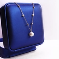 Minimalist gold necklace with a large white Edison pearl pendant and small beads - 3A Quality (Gold Plated) / White
