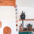 Bohemian style wall decor featuring seven natural gemstones on bronze metal rings - Seven Color Crystal Stone (Rose Gold Ring)