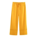 Détail du pantalon large jaune vif avec cordon de serrage réglable et taille élastique - S / Bottoms / Jaune