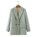 Detail of double-breasted mint green blazer with black buttons and flap pockets - Light Green