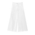 Detail of white high-waist wide-leg trousers featuring double-button closure and pleated design - White Wide Leg Pants