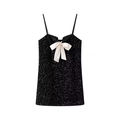 Elegante top nero con paillettes da donna con un grande fiocco in raso bianco - XS / Nero