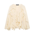 Dettagli di volant a strati su una camicetta in chiffon crema con elegante scollo a V profondo - XS / Albicocca