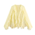 Detail of layered ruffles and buttons on light yellow chiffon v-neck long sleeve shirt - XS / Yellow