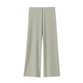 Macro detail of high-waist pleated wide-leg trousers in light grey green color - Green Pants