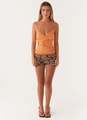 Detailed close-up of orange satin tank top with floral embroidery and sequins - S / Tops / Orange