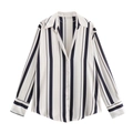 Close-up of vertical black and white striped satin shirt with pearlescent buttons - Blue Striped