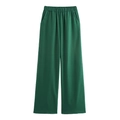 Detail of green wide-leg trousers featuring elastic high waist and side pockets - XS / Bottoms / Green