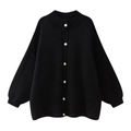 Close-up of black oversized knit cardigan featuring decorative gold embossed metal buttons - S / Black