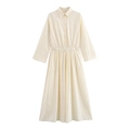 Detail of the elastic gathered waist and button closure on this cream midi shirt dress - XS / Off White