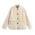 Women's cream quilted jacket with stylish leopard print lining and large black buttons - S / Milky White
