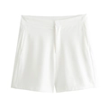 Close-up of white high-waisted tailored shorts featuring button closure and side pockets - S / Shorts
