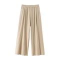 Detail van beige linnen broek met elastische taille en verticale plooien textuur - XS / Camel Broek