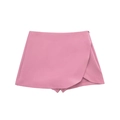 Detail view of pink high-waisted asymmetric skort with a clean wrap-front design - Pink