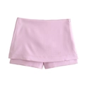 Détail de la jupe-short rose clair à taille haute avec fermeture éclair latérale - XS / Jupe-short Rose