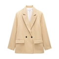 Detail shot of beige double-breasted blazer lapel and brand label with S size mark - Khaki