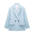 Close-up of light blue double-breasted blazer showing lapels and black buttons - Light Blue