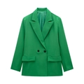 Detail of green double-breasted blazer with peak lapels and flap pockets on plain white background - Dark Green