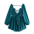 Detail of teal V-neck dress featuring lace-up waist bow and elegant lantern sleeves - Blue