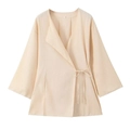 Detail view of the wrap-style linen blend V-neck blazer showing fabric texture and side tie - XS / Tops / Off White