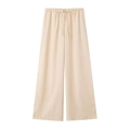 Detail of light beige wide-leg linen trousers with elastic drawstring waistband and texture - XS / Bottoms / Off White