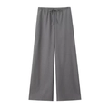 Dettaglio dei pantaloni larghi in lino grigio scuro con elastico e coulisse in vita - Pantaloni Grigi / XS