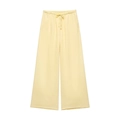 Detail of light yellow linen trousers with an elastic waistband and drawstring - XS / Bottoms / Yellow