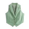Detail of light green vest showing four tortoiseshell buttons and V-shaped hemline - Green