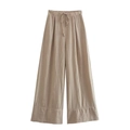 Détail du pantalon large en lin kaki avec taille élastique à cordon et tissu texturé - XS / Bas / Kaki