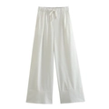Détail d'un pantalon en lin blanc à taille haute avec cordon de serrage élastique confortable - XS / Bas / Blanc