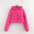 Close-up of bright pink hooded puffer jacket with quilted texture and drawstring hem - Rose Red