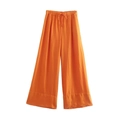 Détail du pantalon large en lin orange vif avec taille élastique à cordon de serrage - XS / Bas / Orange