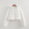 Detail view of white puffer jacket with horizontal quilting and adjustable drawstring hem - White