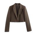 Close-up of brown cropped blazer featuring peak lapel and size S collar label - S / Tops / Brown