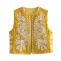 Dettaglio del gilet giallo senza maniche con ricami floreali bianchi e apertura frontale - XS / Giallo Zenzero / Giallo