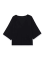 Detail of a black knit top featuring a deep V-neckline and loose three-quarter sleeves - S / Black