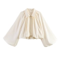 Detailed view of cream satin jacket with balloon sleeves and smooth zipper closure - S / Off White